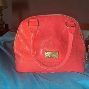 Betsey Johnson Coral pink skull purse